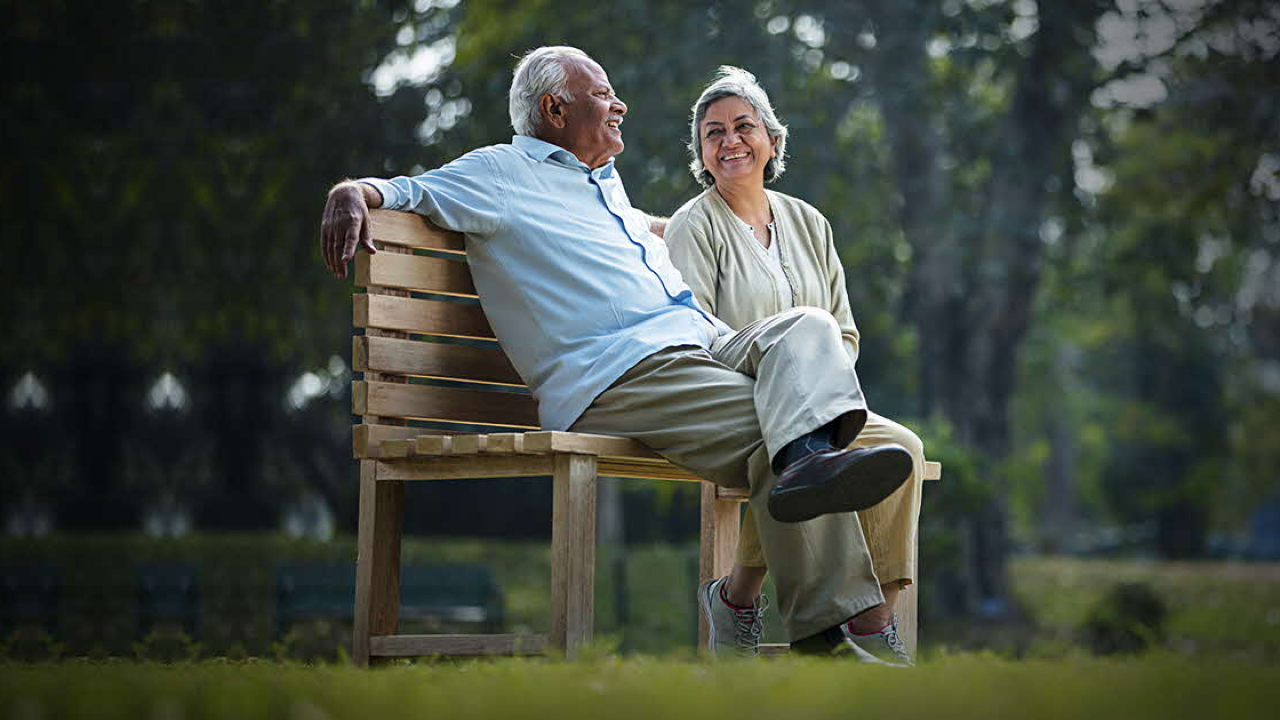 A couple sitting in the park