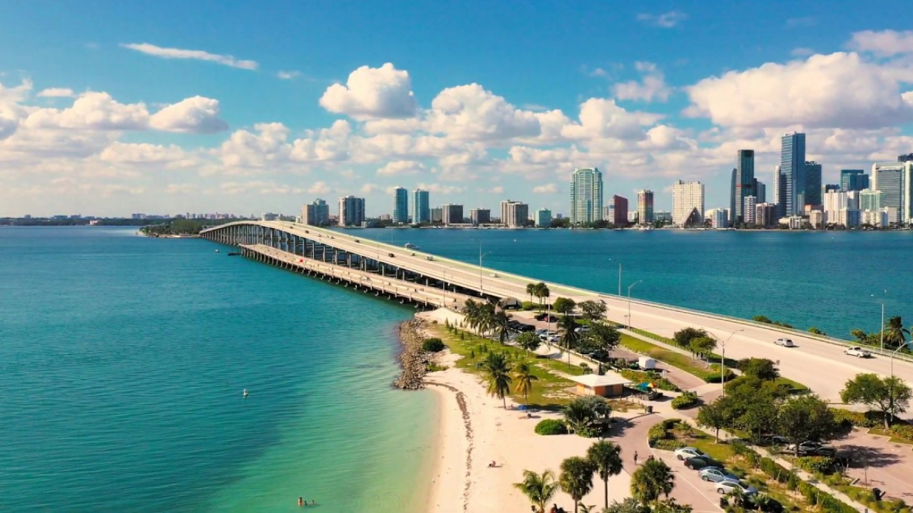 Hobie/Windsurfer costal area in miami with appealing sky views