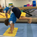 a child is doing hop gymnastics