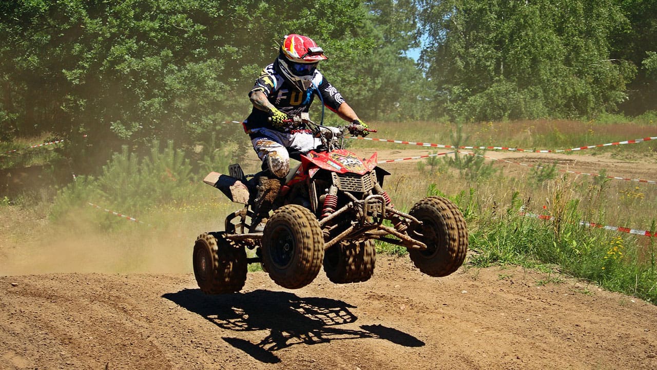 ATV Quad motocross involves all terrain vehicles