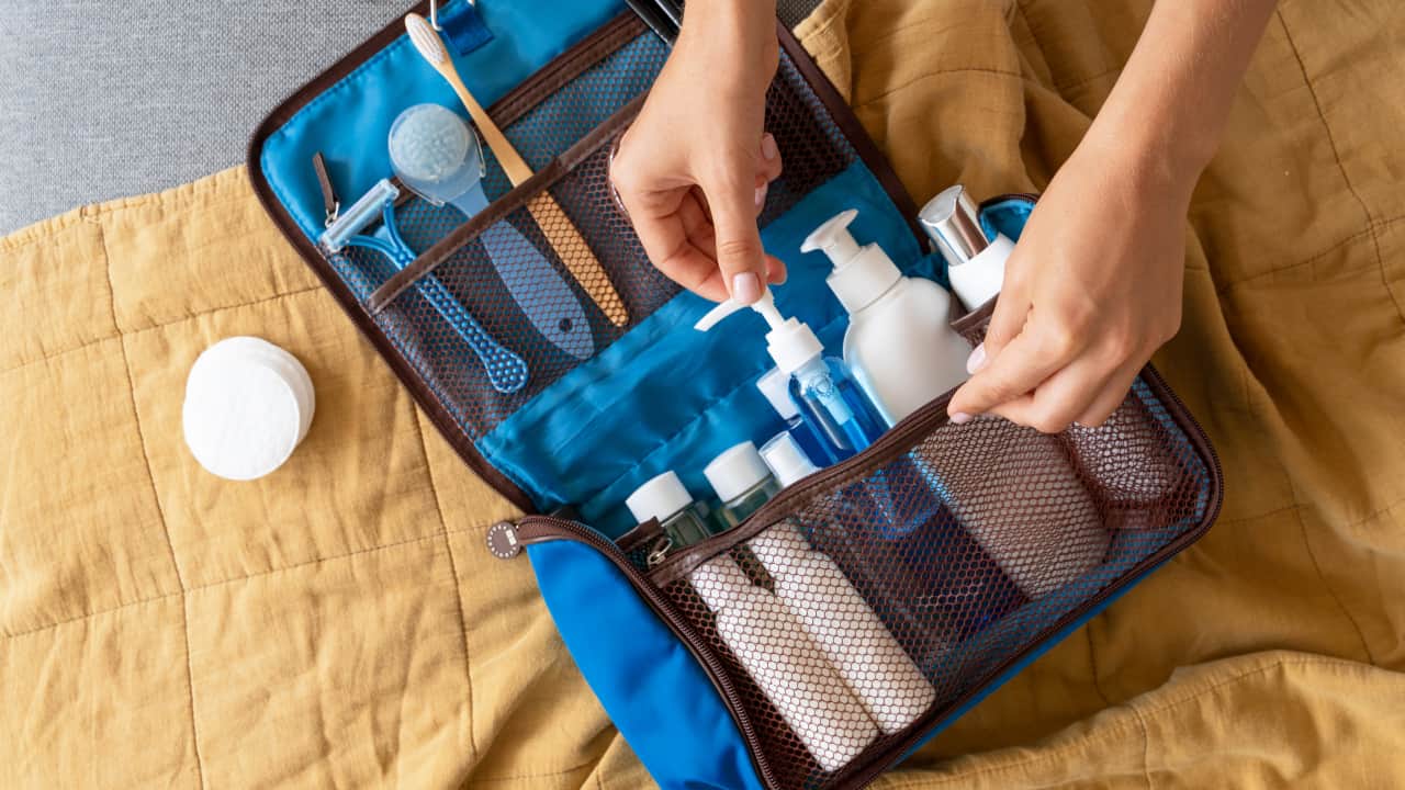 Packing toiletries in a travel-sized bag