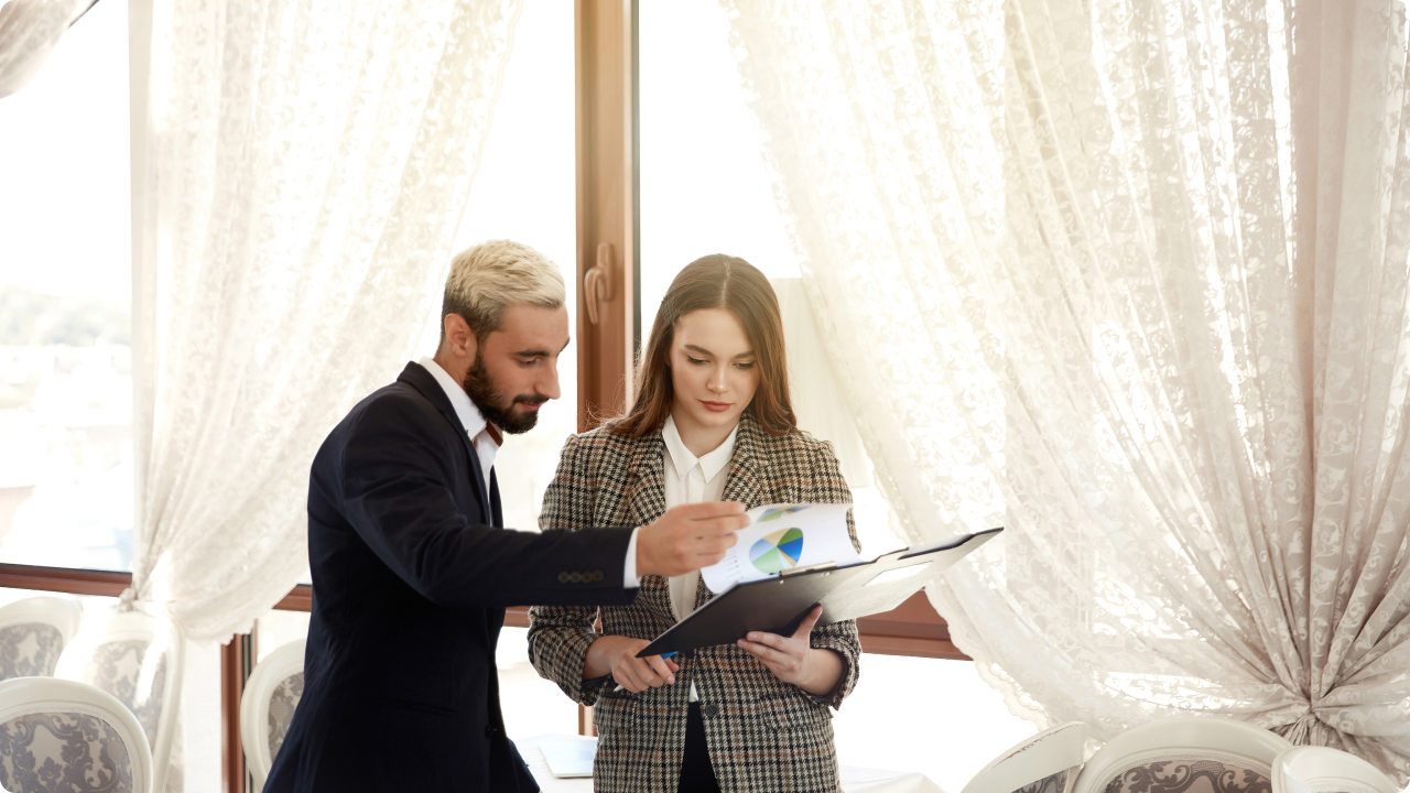 man and women looking at a diagram