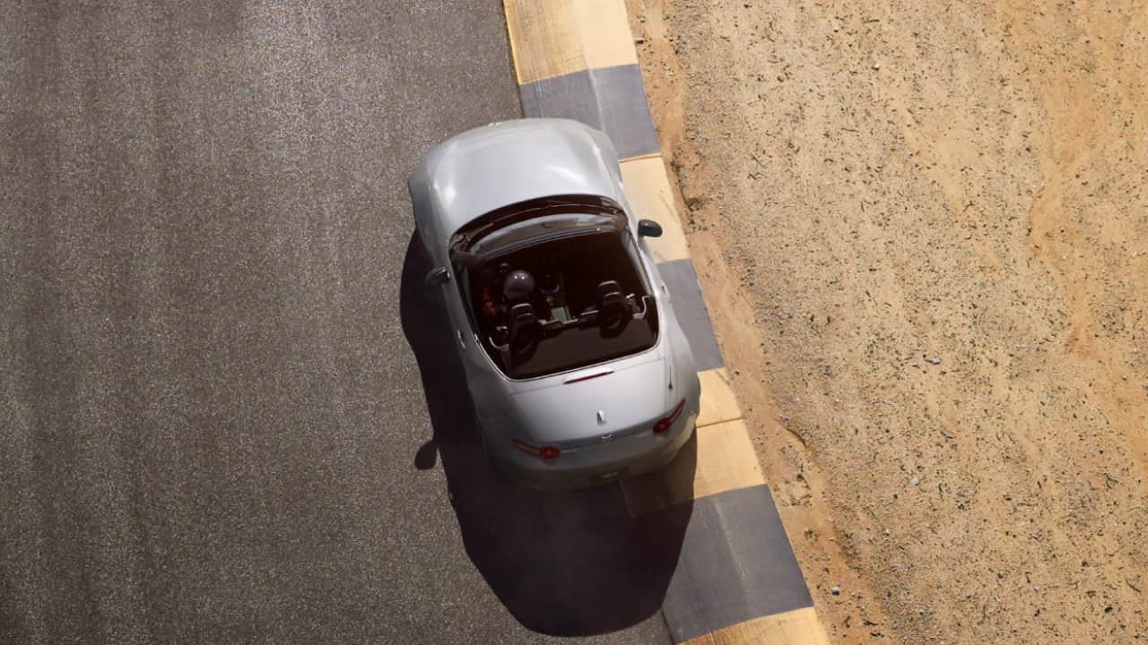 upper view of mazda miata on a roadside