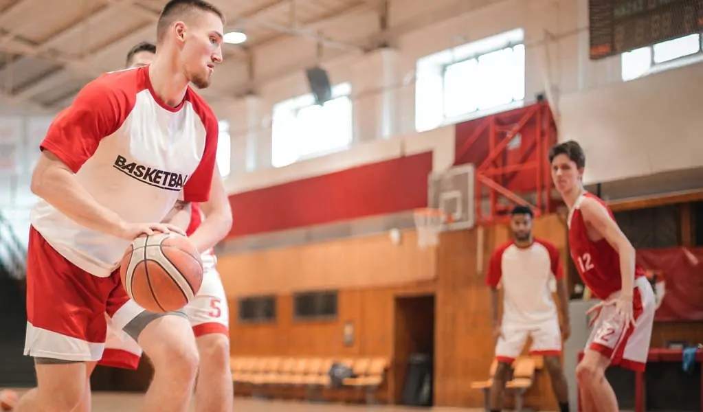 Man playing Basketball Game