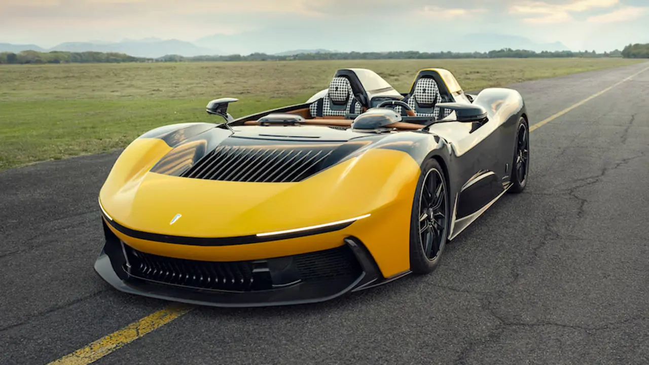 on track click of Pininfarina B95 Barchetta yellow open roof car